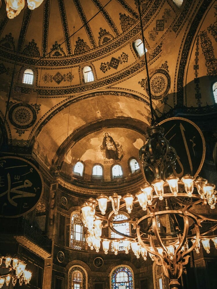 Close-up of Hagia Sophia's ornate mosaics and grand architectural details, reflecting its rich cultural history.