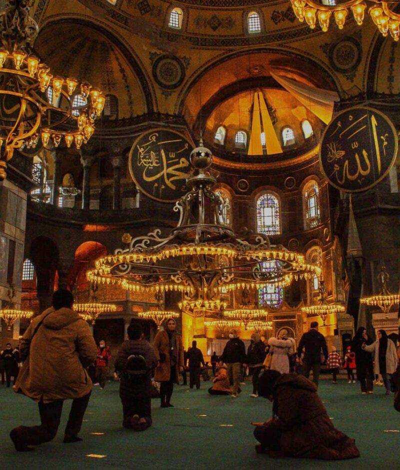 Stunning interior view of Hagia Sophia, showcasing its intricate mosaics, grand arches, and rich history as a symbol of Byzantine and Ottoman culture.