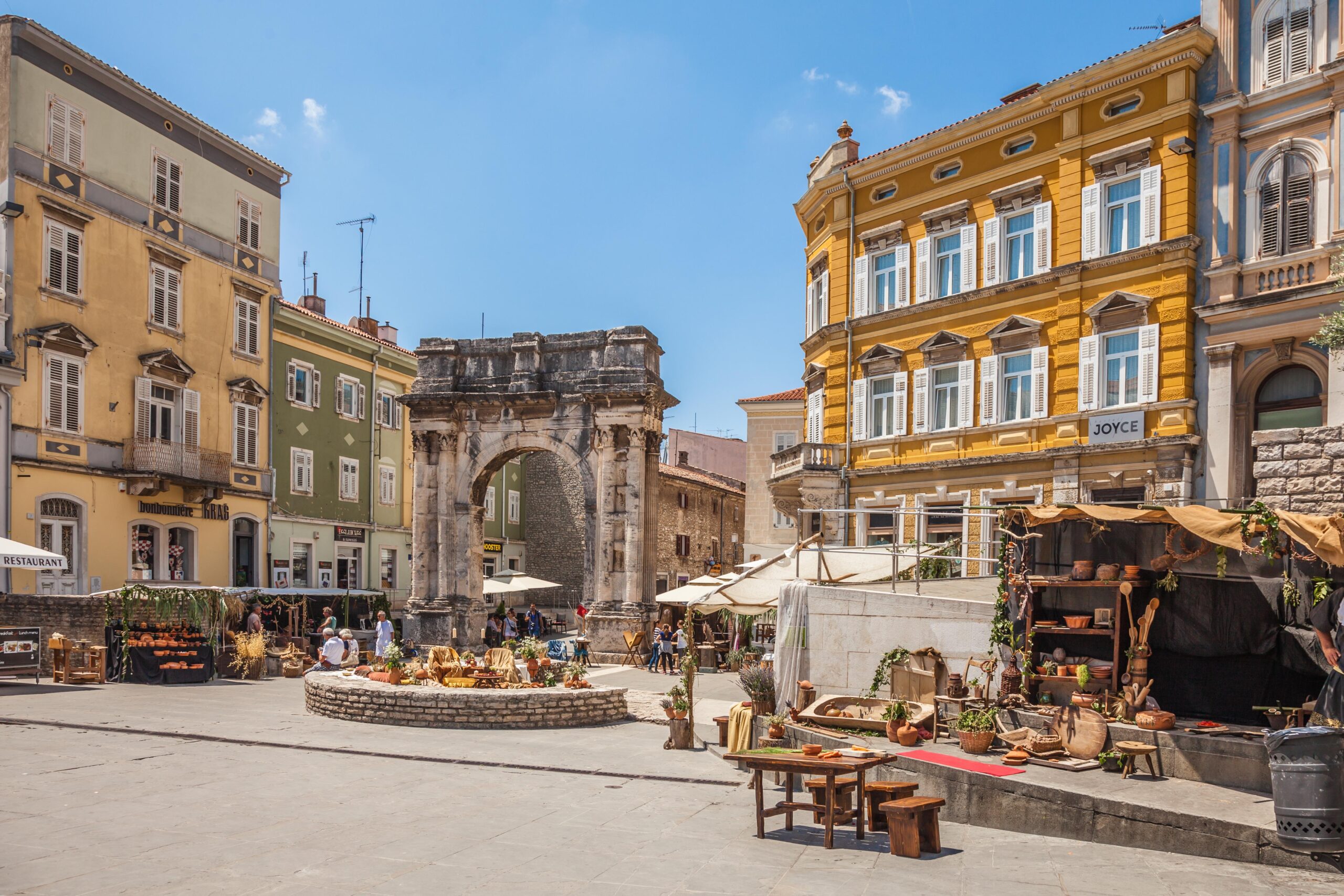The ancient Roman arch in Pula, city of amazing Roman remains and one of the largest and best-preserved amphitheaters in the world.