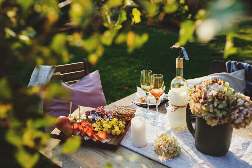 A table set for lunch in a summer garden in the Balkans