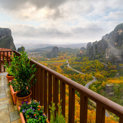 View of the autumn mountaisn and cliffs from teh balcony of a room in Zagori, Greece