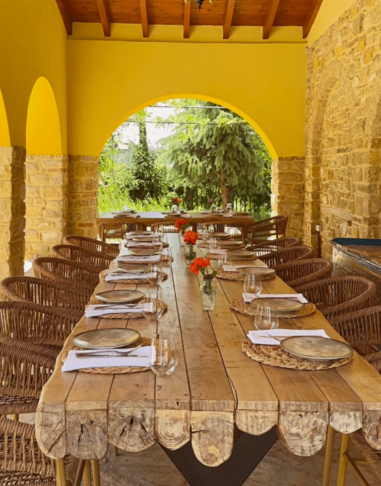 A rustic table set for lunch in a farm-to-table in northern Albania