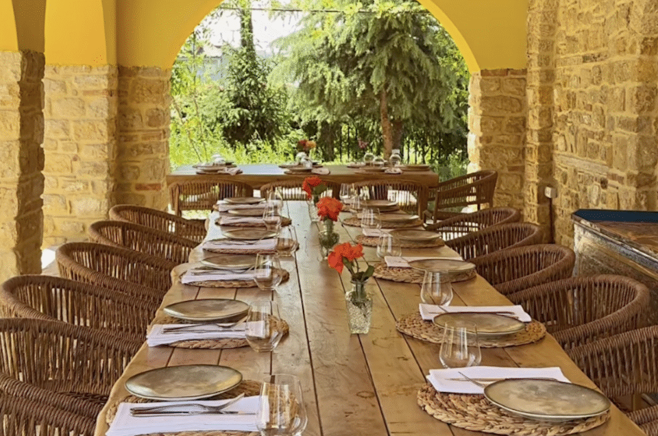 A rustic table set for lunch in a farm-to-table in northern Albania